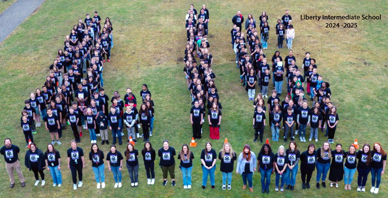 LIS Students arranged in the letters L I S